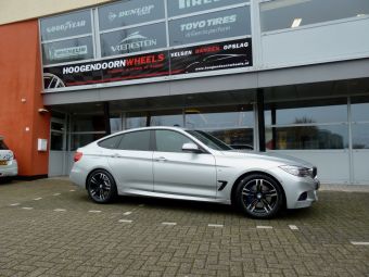 NIU wheels type Bayern zwart gepolijst 18 inch onder een BMW 3 serie GT 