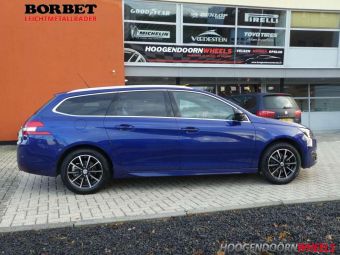 BORBET VELGEN BL 5 ZWART GEPOLIJST 16 INCH MET WINTERBANDEN ONDER EEN PEUGEOT 308