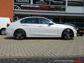 NIU WHEELS BAYERN  ZWART GEPOLIJST IN 19 INCH GEMONTEERD ONDER EEN BMW 3 SERIE 